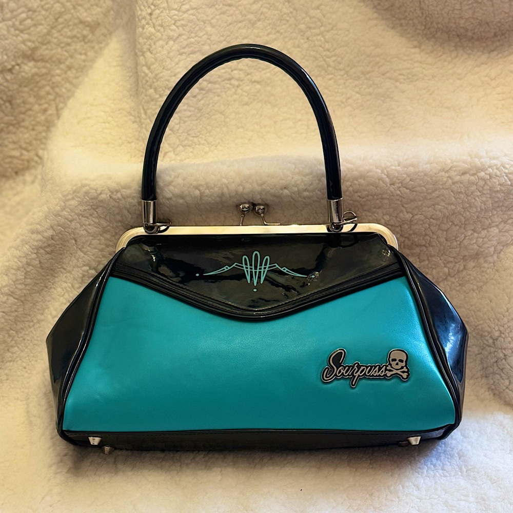 Sourpuss Backseat Baby Purse